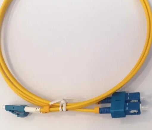 Bota amarilla del cortocircuito del cordón de remiendo de la fibra óptica del SC LC ALREDEDOR de DX